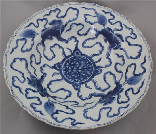 A Chinese blue and white lion-dog dish, Kangxi period, 35.5cm